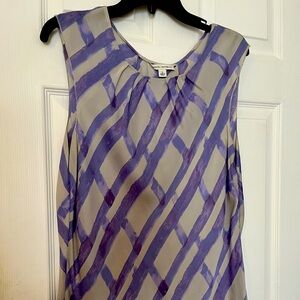 Barely worn fancy silk sleeveless blouse